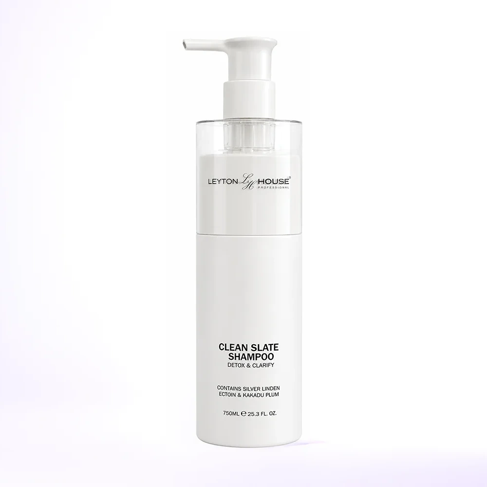 A bottle of Leyton House Clean Slate Shampoo with a white pump dispenser and a clear cap, set against a clean white background with a subtle purple gradient.