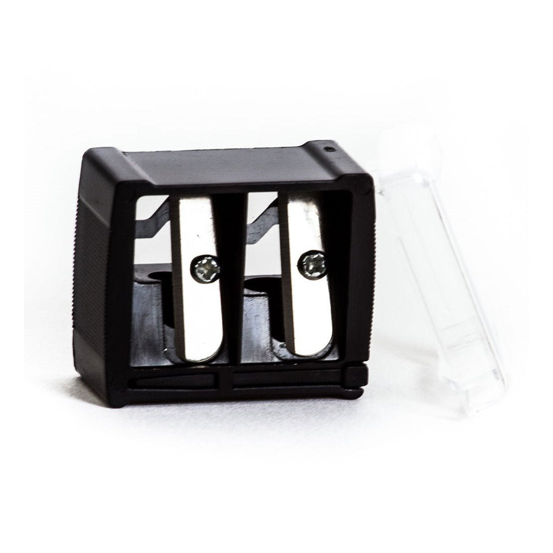A black cosmetic pencil sharpener with a double hole design and a transparent cover on top, placed on a white surface.