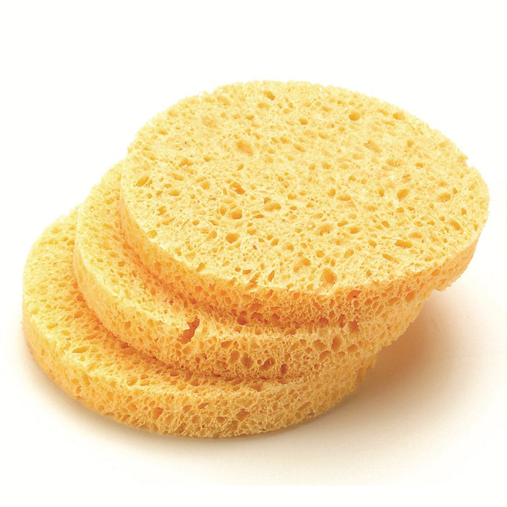 Three latex cosmetic sponges stacked on top of each other against a white background.