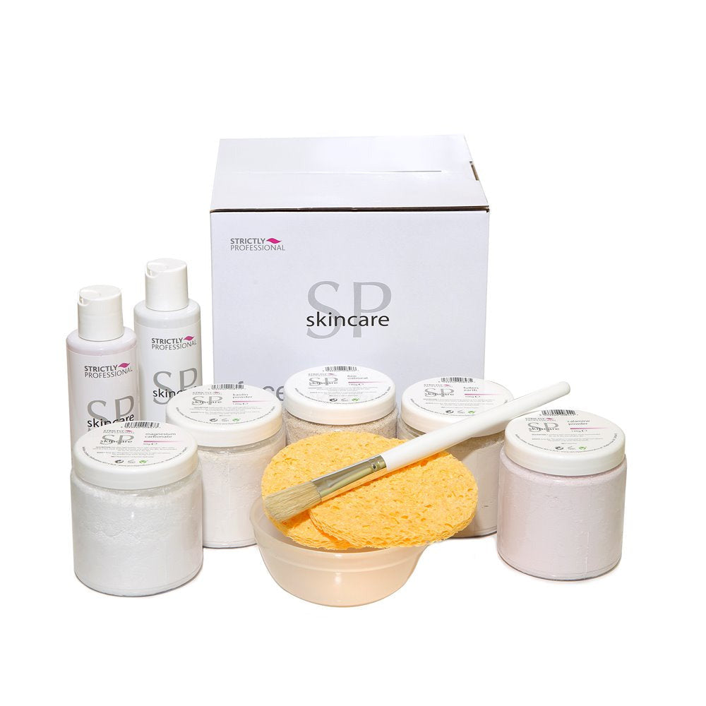 A collection of skin care product starter kit including various powders and a mask brush, displayed with a label that reads 'SP'.
