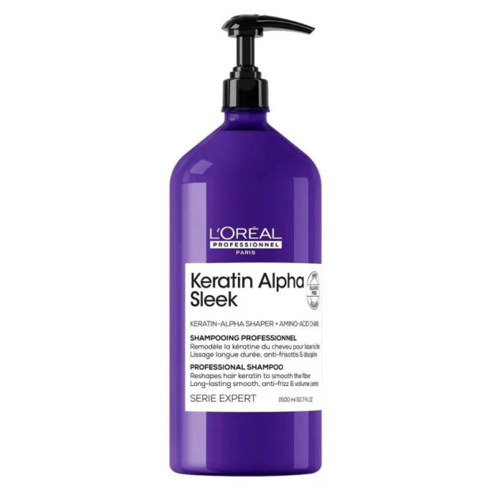 Purple shampoo bottle with pump labeled 'Keratin Alpha Sleek' on a white background