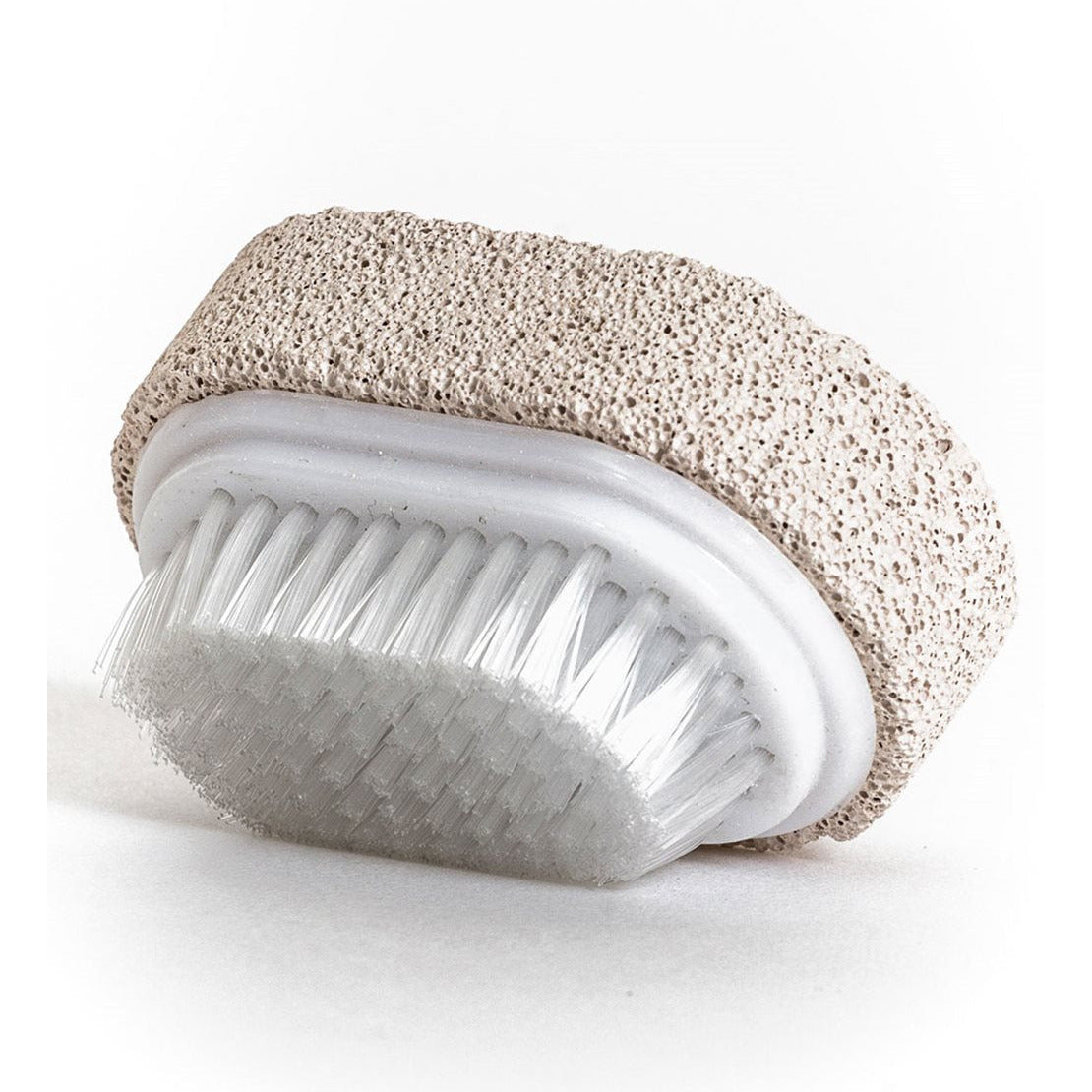 A double-sided nail brush with a pumice stone on one side and a bristled brush on the other, primarily beige in color.