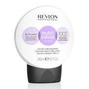 A bottle of Revlon Nutri Color Filters hair colour product in 1002 Pale Platinum, displayed on a white background.