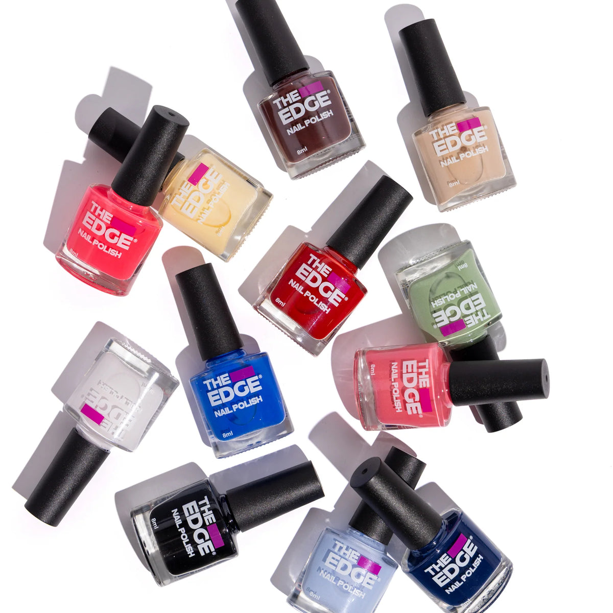 a group of The Edge Nail Polsh Lacquer polishes in a picture on a white background, showcasing a range of colours