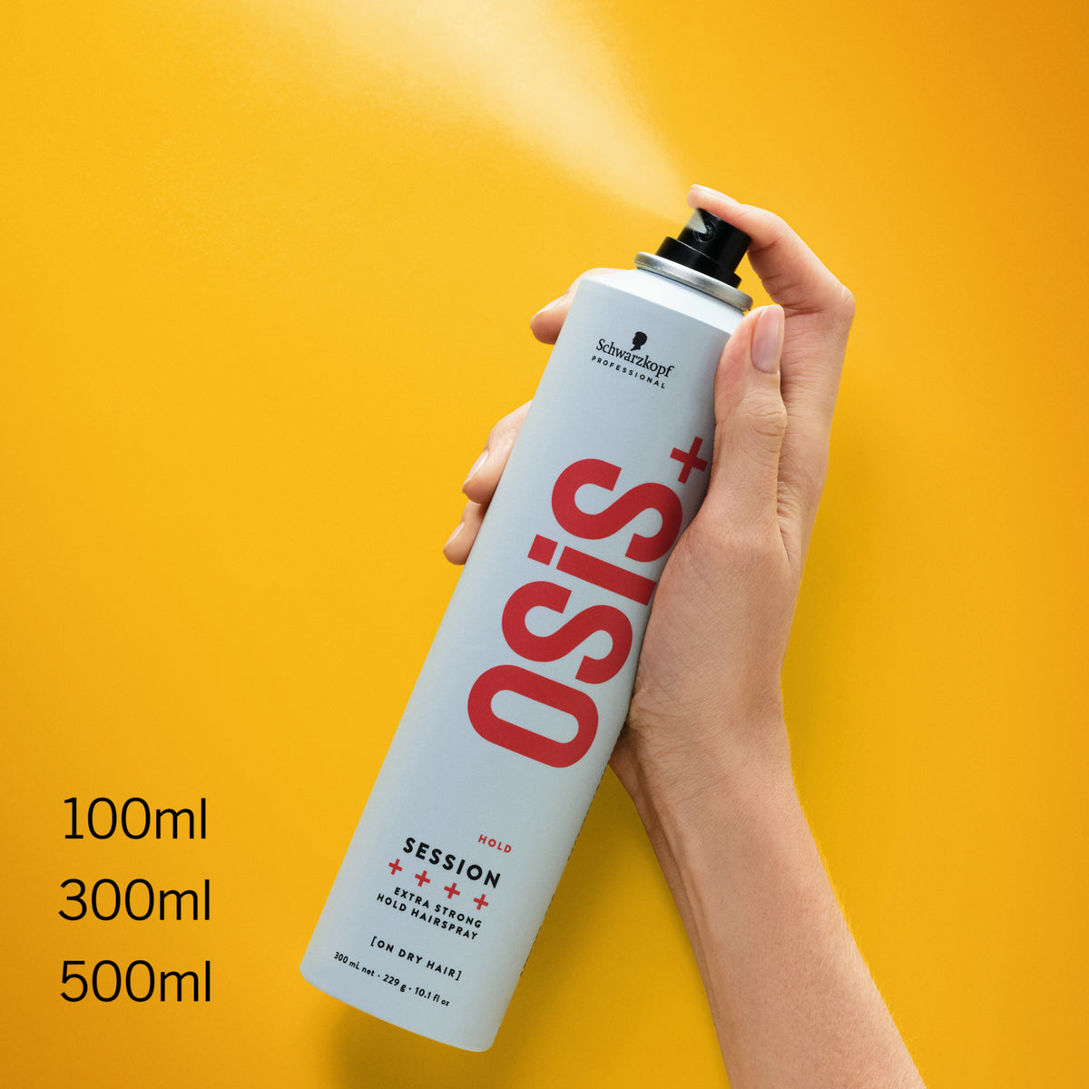 A hand holding a can of Osi+ Session + Ultra Strong Hold Hair Spray against a bright yellow background, with text on the left showing 100ml, 300ml, and 500ml volume options.