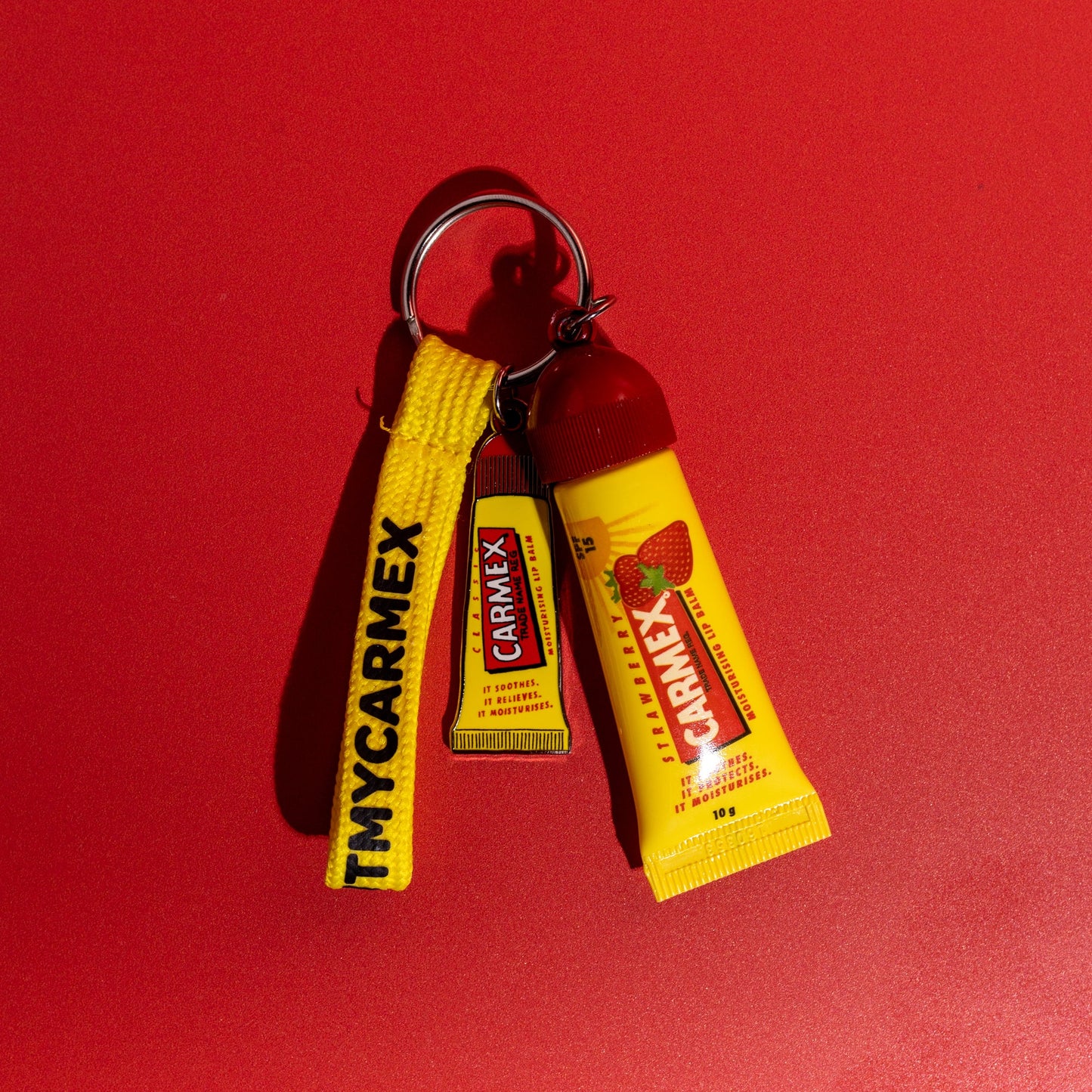Carmex Strawberry Tube Keyring Gift Set – Lip Balm, Keyring & Wristband