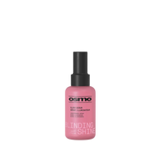 A pink bottle of Osmo Blinding Shine Glaze Serum with a black spray cap, centered on a plain white background.