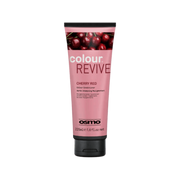 Osmo Colour Revive Cherry Red hair color conditioner tube on a green background