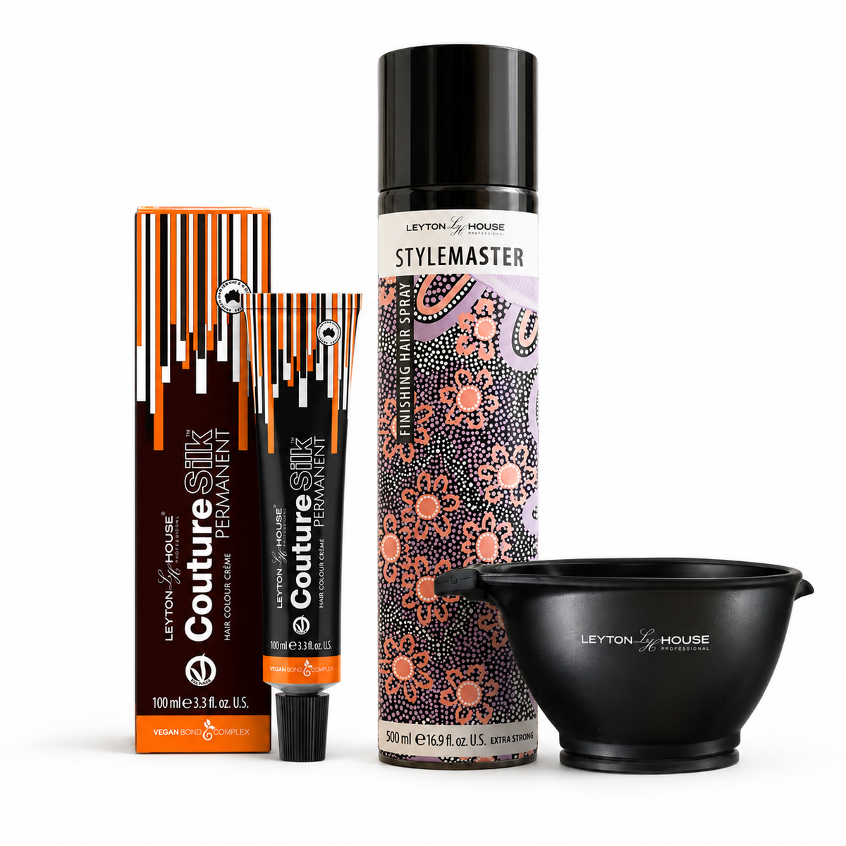 Leyton House Stylemaster hair styling kit including a Couture Silk Textured Wax tube, matching box, styling foam can, and a black mixing bowl on a white background.