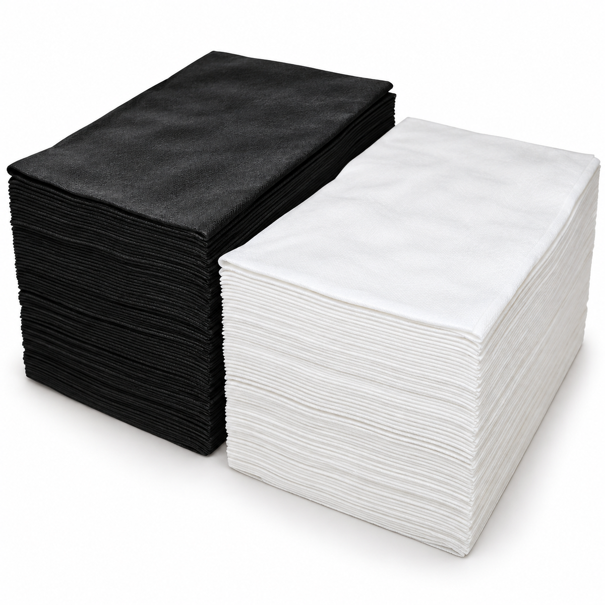 Two stacks of square fabric cloths, one black and one white, displayed side-by-side on a clean white background.