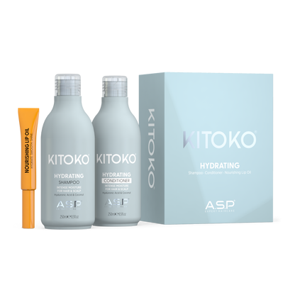 KITOKO Hydrating Shampoo and Conditioner set by ASP, featuring two light gray bottles with silver caps, an orange nourishing up oil tube, and a light blue product box on a white background.