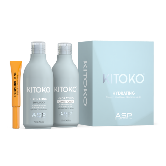 KITOKO Hydrating Shampoo and Conditioner set by ASP, featuring two light gray bottles with silver caps, an orange nourishing up oil tube, and a light blue product box on a white background.