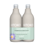 Two bottles of Kitoko hair growth shampoo and conditioner on a white background