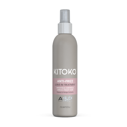 A 250ml bottle of KITOKO Anti-Frizz Leave-In Treatment by A&Y Beauty, featuring a matte taupe-gray bottle with a silver spray nozzle and a pink label accent.
