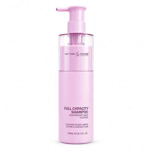 A bottle of Leyton House Full Capacity Shampoo in a light pink color, featuring a clear upper section with a pink pump dispenser, set against a plain white background.