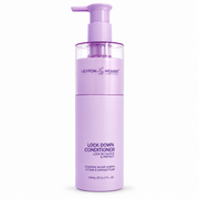 A lavender purple pump bottle of Leyton House Lock Down Conditioner on a clean white background.