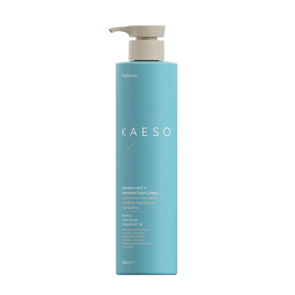 A tall, cylindrical bottle of Kaeso Menthyl + Food Lotion in a light blue color with a beige pump dispenser, shown on a plain white background.