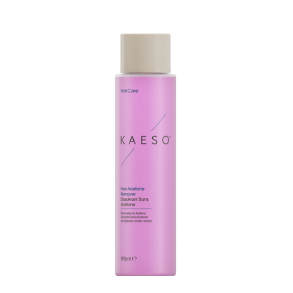 A bottle of KAESO Nail Care Non Acetone Remover in a light pink bottle with a beige cap, shown on a plain white background.
