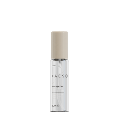 KAESO Optic Hydro Eye Gel in a clear cylindrical bottle with a beige cap, shown on a plain white background.