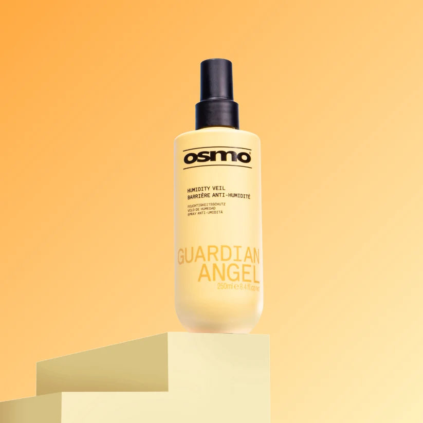 Osmo Guardian Angel hair product bottle on a peach background