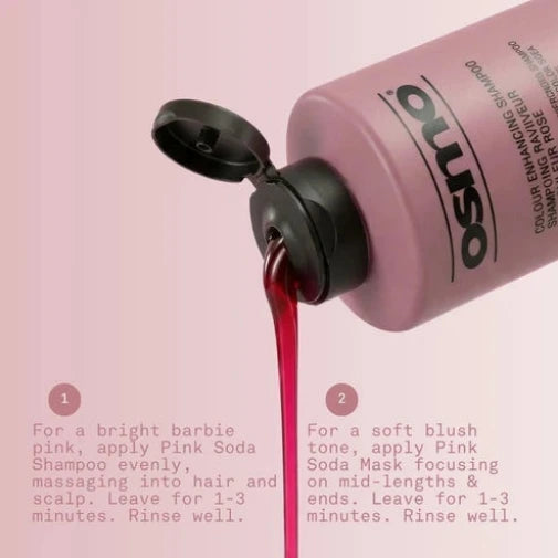 Pink bottle of Pink Soda hair care product with red liquid being poured, on a pink background.