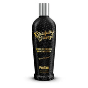 Black bottle of Pro Tan 'Blissfully Bronze' bronzing lotion on a white background