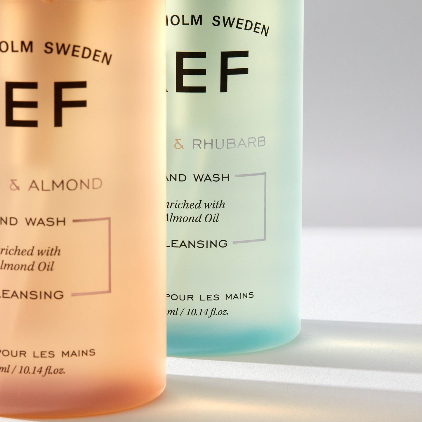 Two bottles of Holm Sweden hand wash on a light background