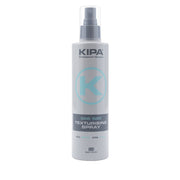 A bottle of Kipa Sea Salt Texturising Spray with a white and blue label, designed for creating a textured matt finish hairstyle.