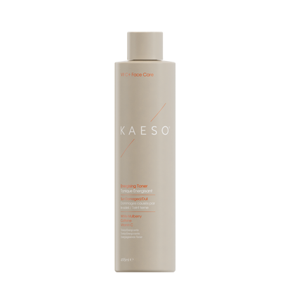 KAESO Wake + Face Care Wake-Up Toner in a tall, cylindrical beige bottle with a matching cap, shown on a plain white background.