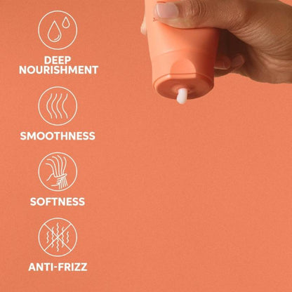 Hand holding a small bottle with icons and text on deep nourishment, smoothness, softness, and anti-frizz. wella Nutri-Enrich conditioner