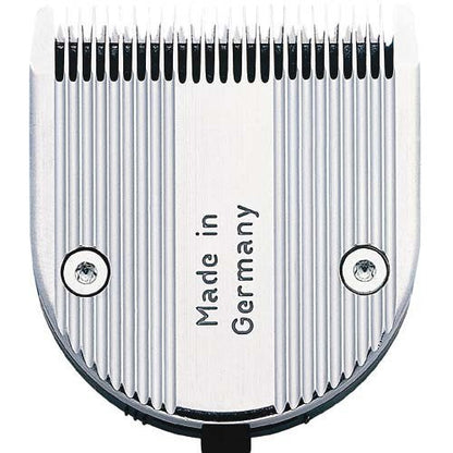 Silver metal hair clipper blade with black teeth and the text 'Made in Germany' printed on the center, shown on a white background.