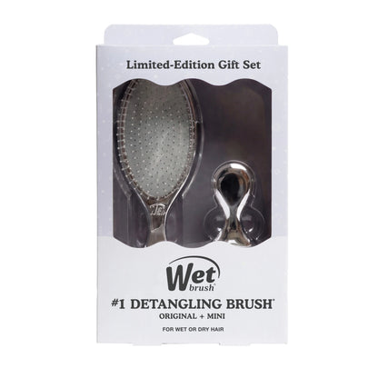 Wet brush limited-edition gift set containing a silver detangling brush and a smaller matching accessory, presented in its original retail packaging.