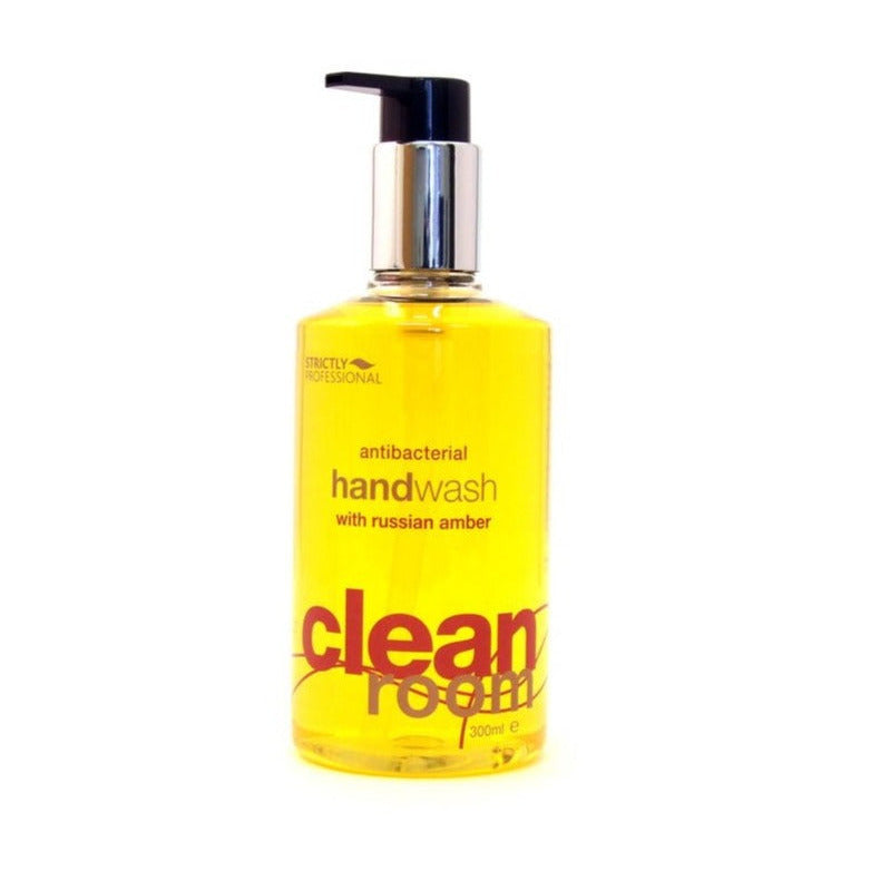 A yellow bottle of antibacterial handwash with a pump dispenser, labeled 'clean fresh'.