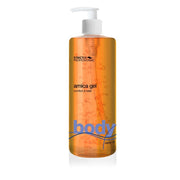 A pump bottle of Strictly Professional Arnica Gel, 500ml, with orange liquid visible inside the transparent bottle.