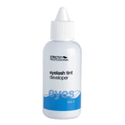 Bottle of Strictly Professional eyelash tint developer on a white background