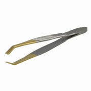 A high-quality stainless steel tweezer with gold-tipped ends.