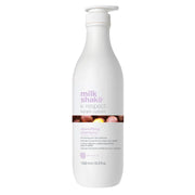 White shampoo bottle with 'milk_shake' branding on a white background