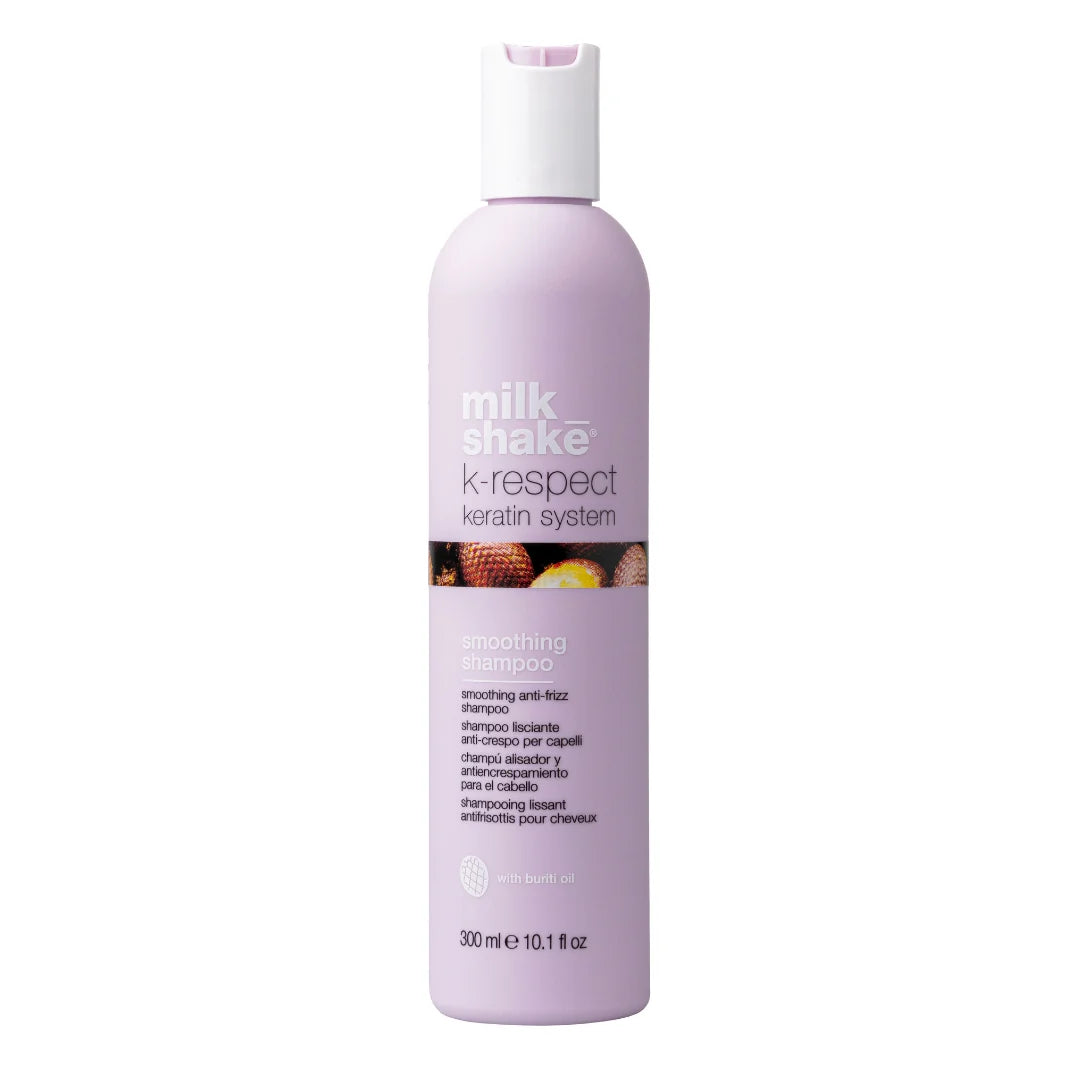 A 300 ml bottle of Milk Shake K-Respect Smoothing Shampoo in a light lavender purple color, featuring a white cap and a label with white text and a small fruit graphic.