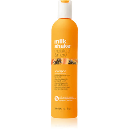 Orange moisturising shampoo bottle with 'milk shake' branding on a white background