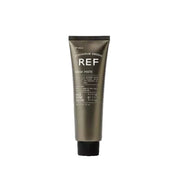 Tube of REF rough paste hair product on a white background