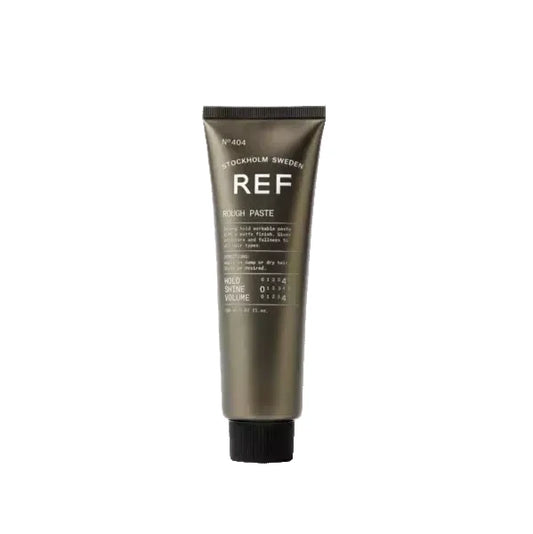 Tube of REF rough paste hair product on a white background