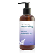 A bottle of Strictly Professional Relaxation Body Oil with a pump dispenser, labeled for aromatherapy use.