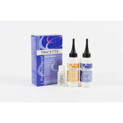 Tricette hair care product set including a box and bottles on a white background