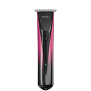 A Wahl cordless hair trimmer with a glossy black and pink gradient handle, shown vertically against a plain white background.